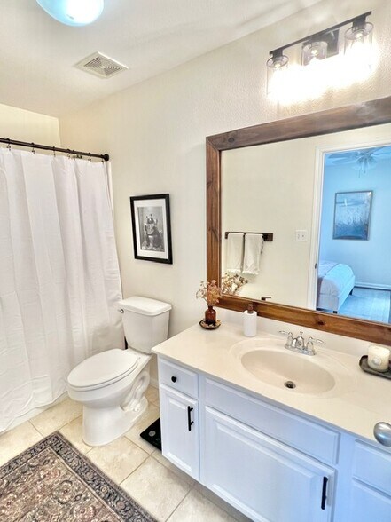 Secondary attached bathroom - 6900 E Riverside Dr
