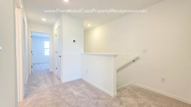 Building Photo - OUTSTANDING BRAND NEW TOWNHOME MOVE IN READY! AZARIO TOWNHOMES LWR !