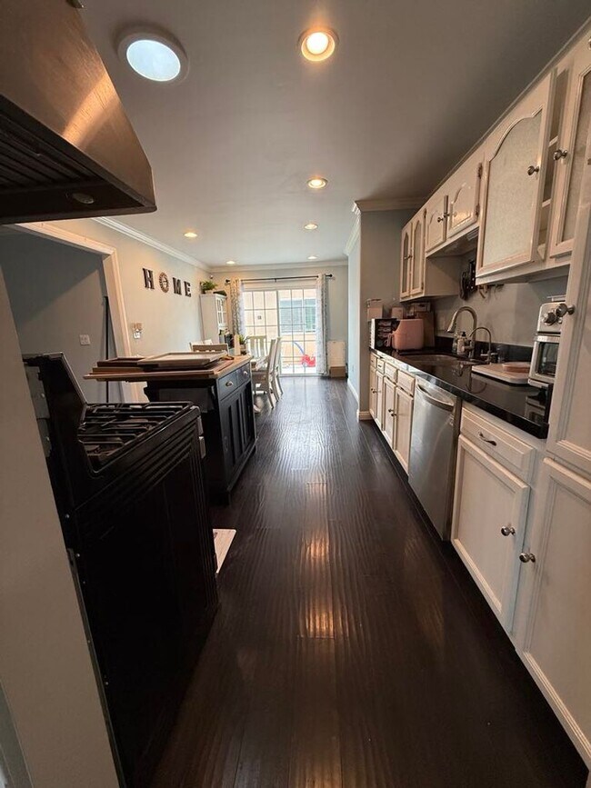 Building Photo - Charming 4-Bedroom, 2-Bath Fully Furnished...