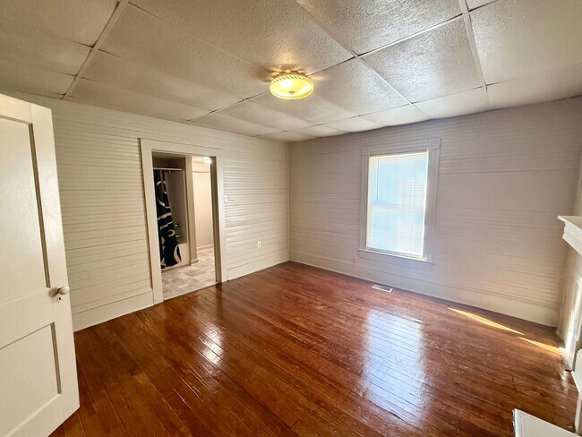 Building Photo - Three Bedroom, 1 Bath Gibsonville Home with Rocking Chair Front Porch