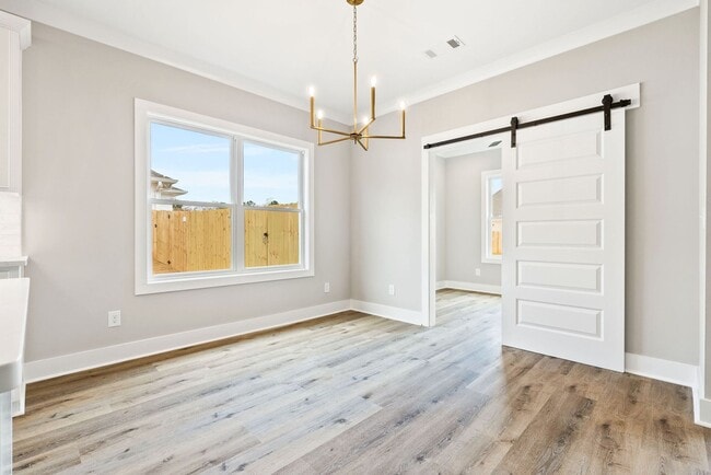 Building Photo - Available now! New Spacious 3 br 2.5 Ba with private 2 car garage, covered patio and fenced in ba...