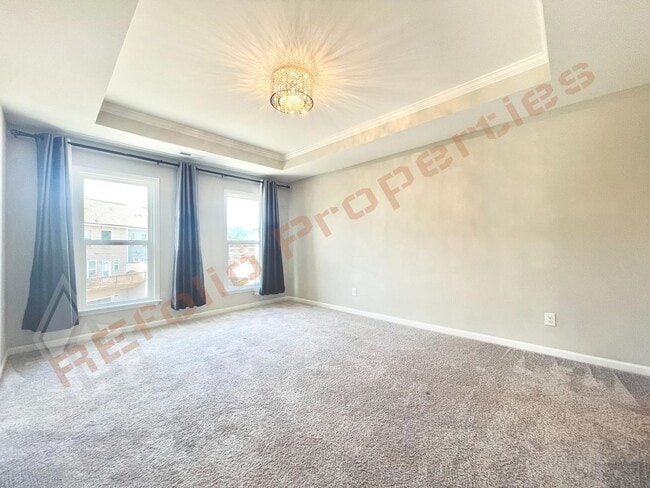 Building Photo - Beautiful End Unit 3 Story 3 bedroom, 3.5 bathroom Townhome with 2 Car-Garage in 540 Townes subdi...