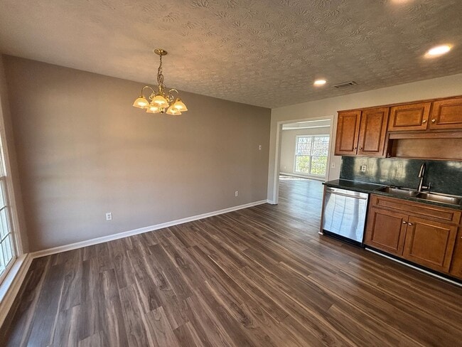 Building Photo - Keys to Happiness – Unlock Your New Home.