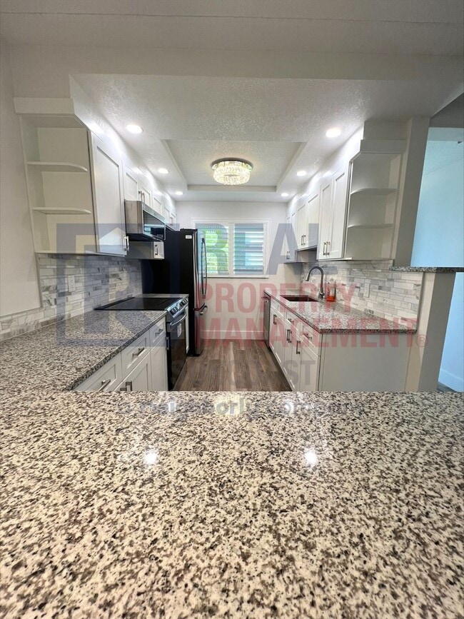 Building Photo - 649 S Tamiami Trl