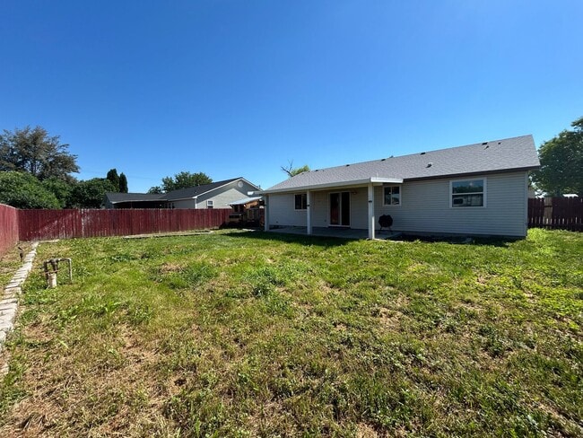 Building Photo - Spacious 4-Bedroom Home with RV Parking & No Backyard Neighbors