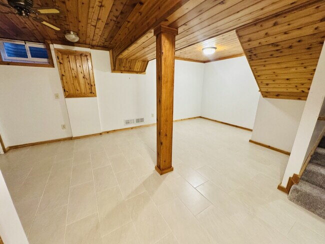 Building Photo - "Charming 4-Bedroom Home with Granite Elegance & Hardwood Warmth in Savage!"