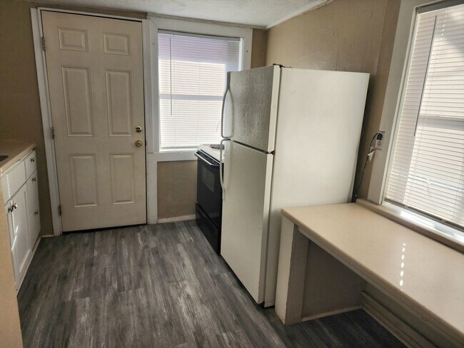 Building Photo - All Bills Paid!