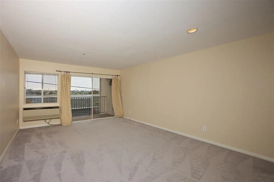View of living room/balcony. Wall air conditioner - 3775 Georgia St