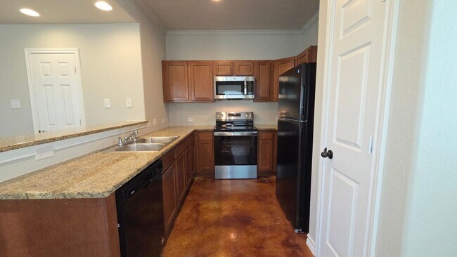 Building Photo - Retreat at Retama Park Townhome