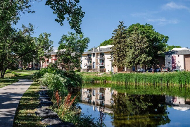 Building Photo - **Move-In Special** Top Floor Condo - Available Now!!