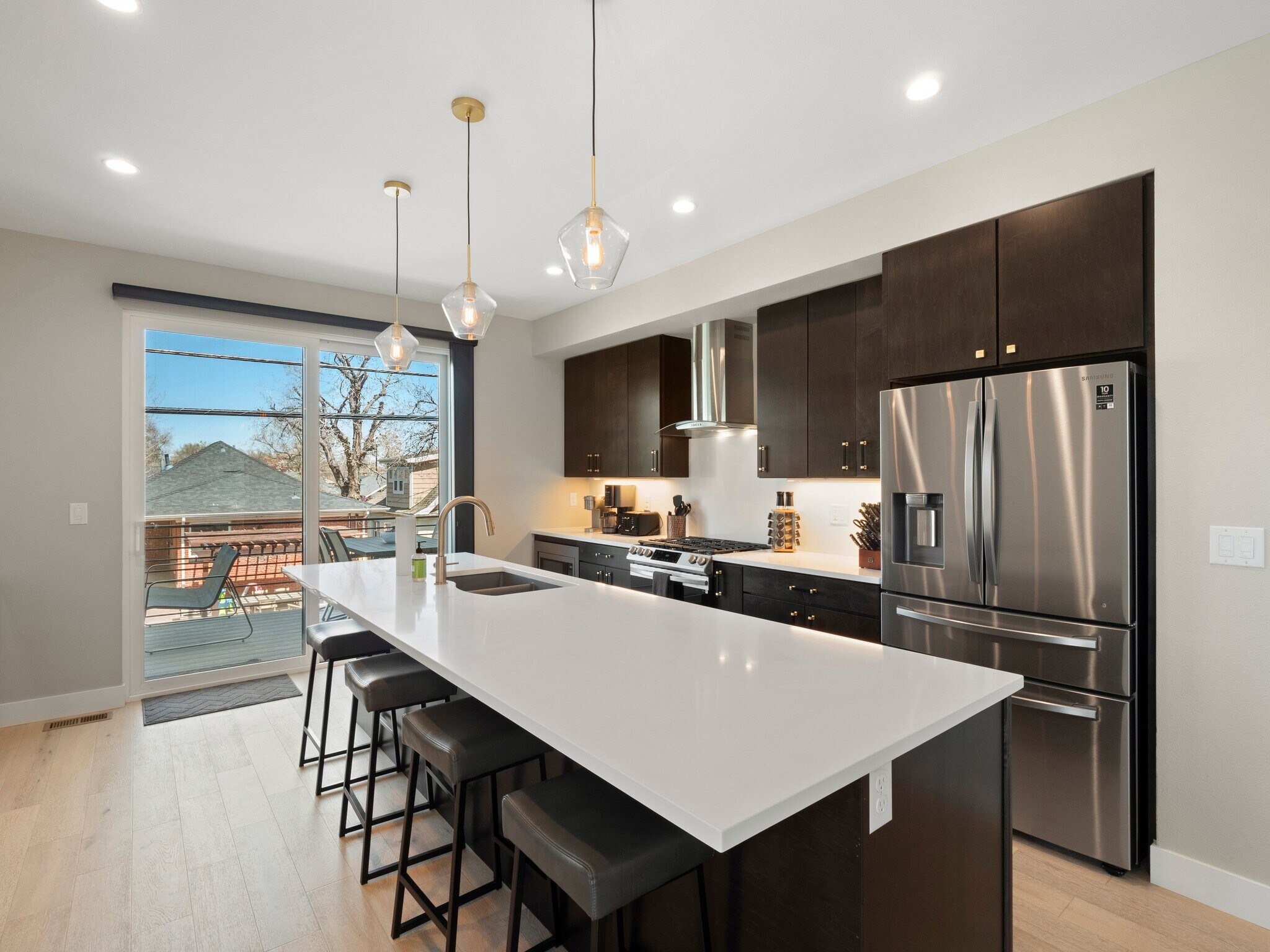 Updated kitchen w huge island - 3840 Eliot St