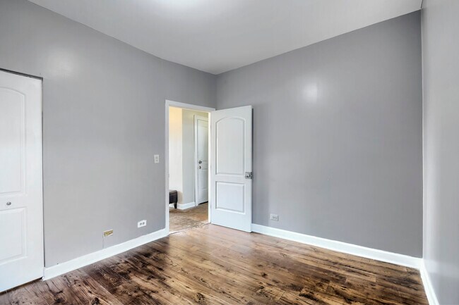 Building Photo - 7724 S Cornell Ave