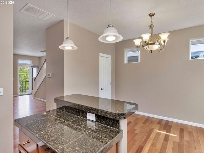 Building Photo - Spacious Living in a Modern Townhome
