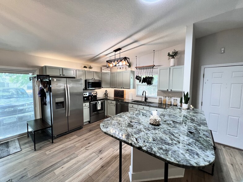 Beautifully Remodeled Open Concept Kitchen with TONS of Storage & Modern Finishes - 808 9th Ave N