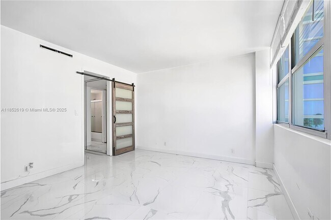 Building Photo - 5055 Collins Ave