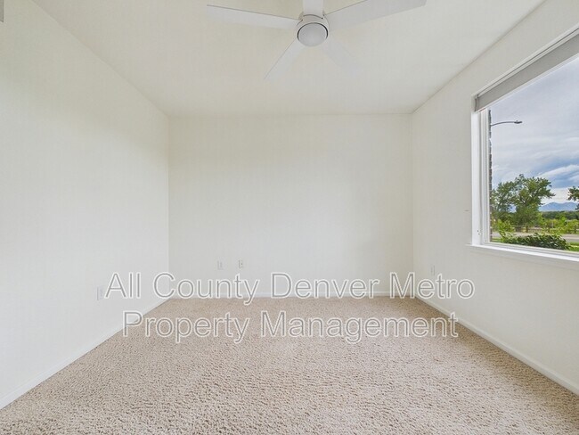 Building Photo - 10239 W 55th Dr