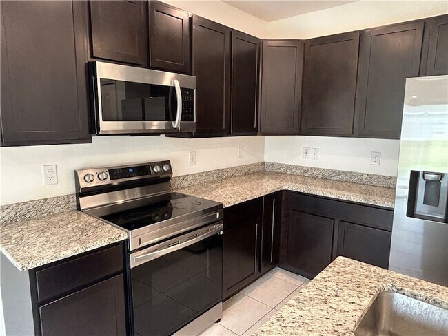 Building Photo - 8046 104th Ct