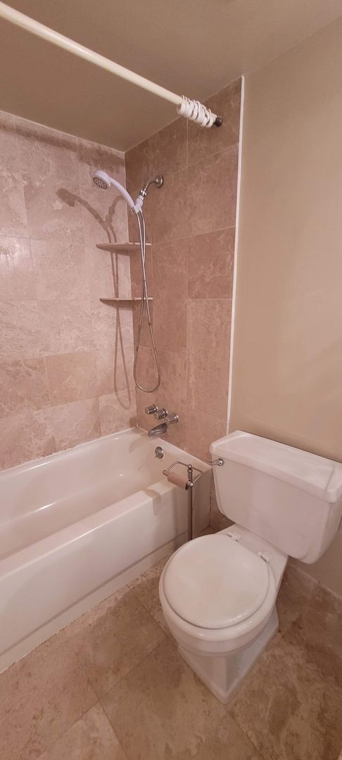 Building Photo - Two-Bedroom Condo| Parking + WiFi Included!