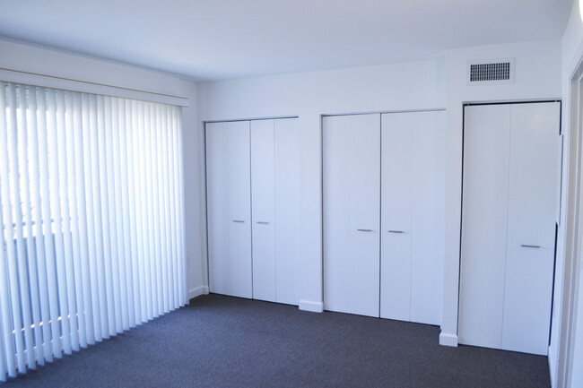 Main Bedroom with closets and laundry. - 452 S Main St