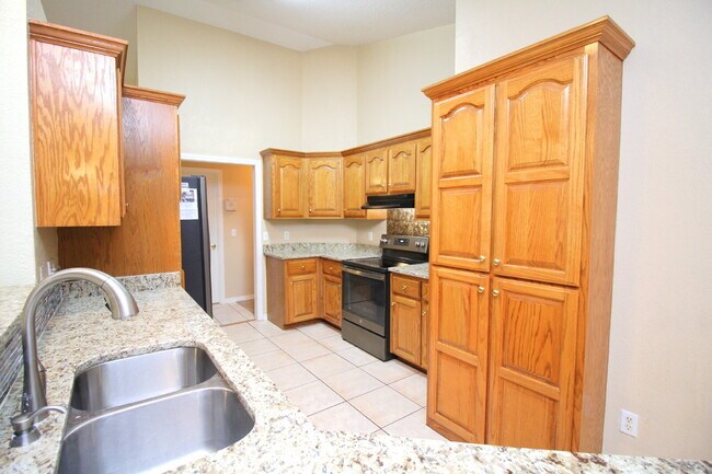 Building Photo - Spacious Oak Meadows Home in Milton with Multiple Living Areas, Fenced Yard & 1/2 Off First Month...