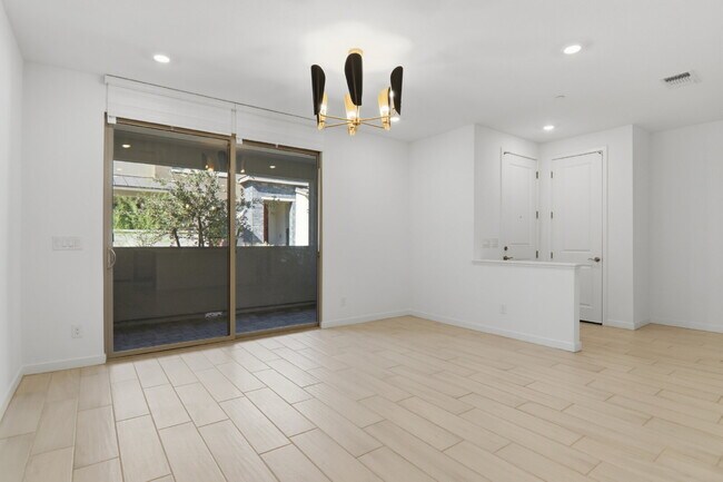 Building Photo - Experience refined living in this beautifully appointed 3-bedroom, 2.5-bathroom townhome spanning...