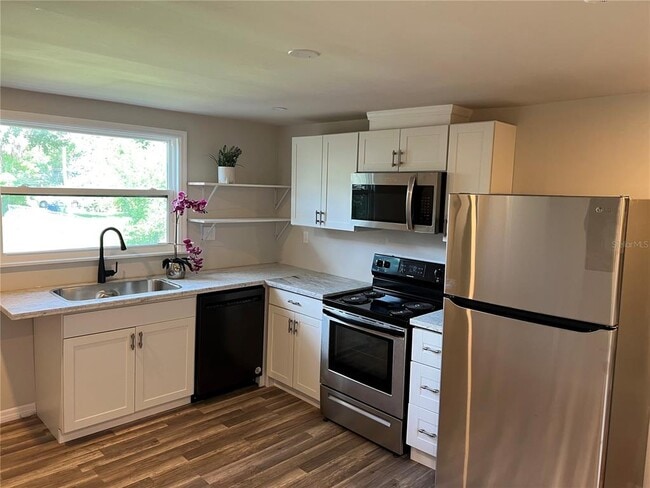 Building Photo - 1006 E 26th Ave