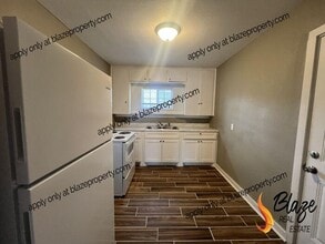 Building Photo - New Management, New Look, New You!
