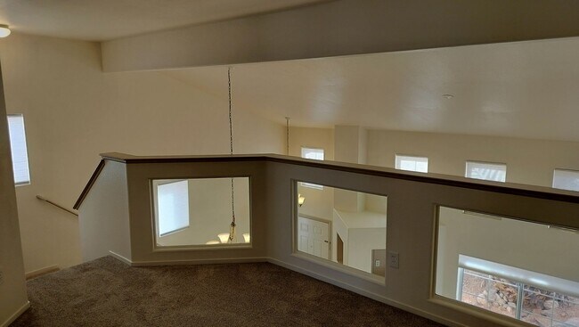 Building Photo - Townhome with Loft + Two Bedrooms/Baths - Designed for Comfort in Gated Community