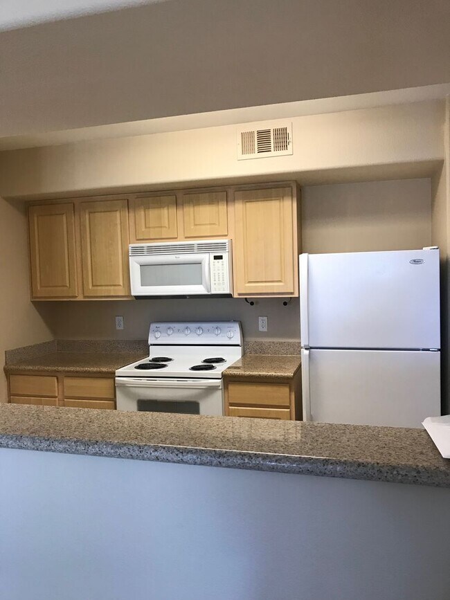 Building Photo - Cozy 1 Bedroom Condo 2nd Floor At Coronado...