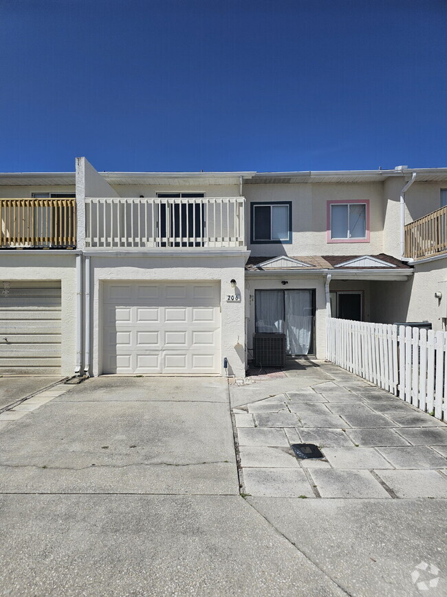 Building Photo - Welcome to your modern beachside retreat!