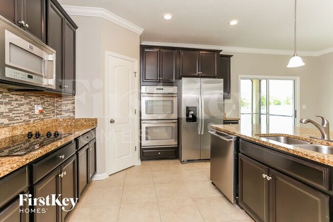 Building Photo - 9019 Devon Pines Dr
