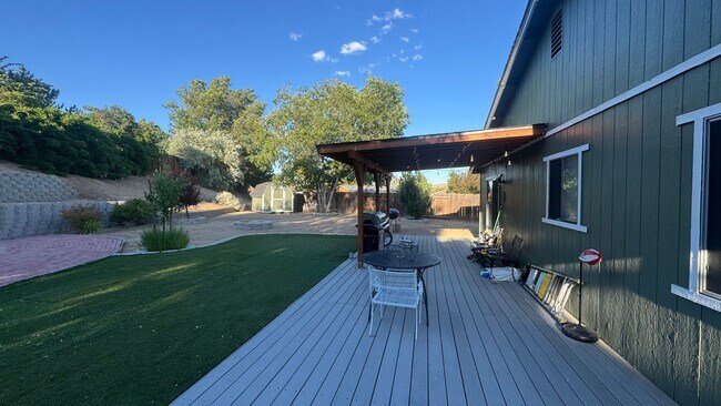Building Photo - 4bed/2bath/2car garage. RV parking & massive landscaped backyard in cut-de-sac