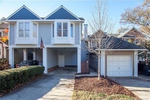 Townhome exterior with 2-car driveway - 404 Clarkson Green St