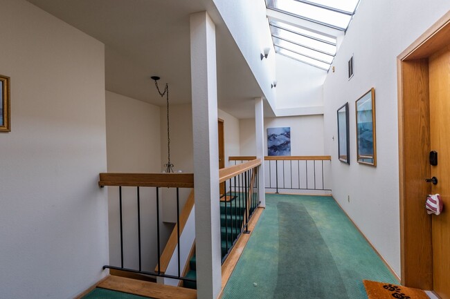 Building Photo - Waterfront Condo with 2 car garage