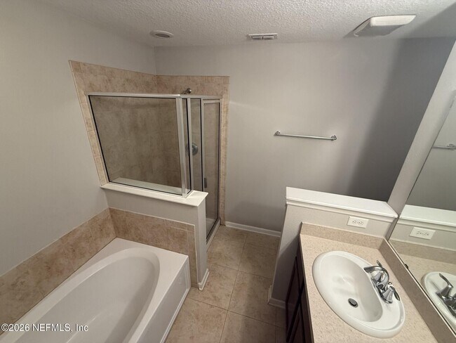 Building Photo - 4220 Plantation Oaks Blvd