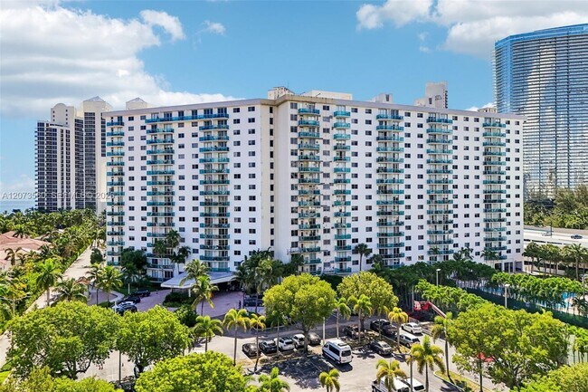 Building Photo - 19370 Collins Ave