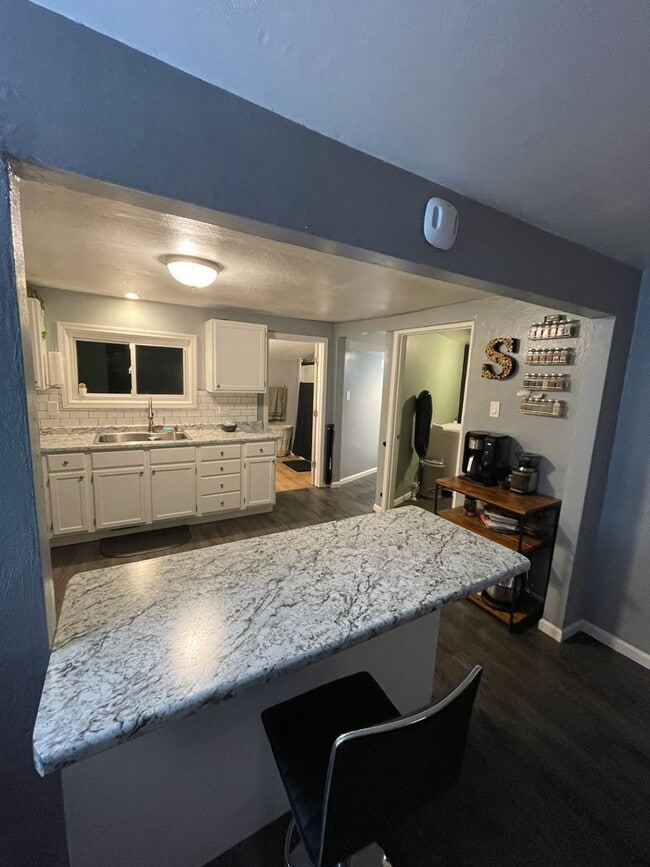 Building Photo - Beautifully updated with modern upgrades and cozy charm. PETS WELCOME