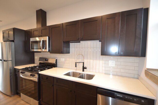 Building Photo - 4411 N Kimball Ave