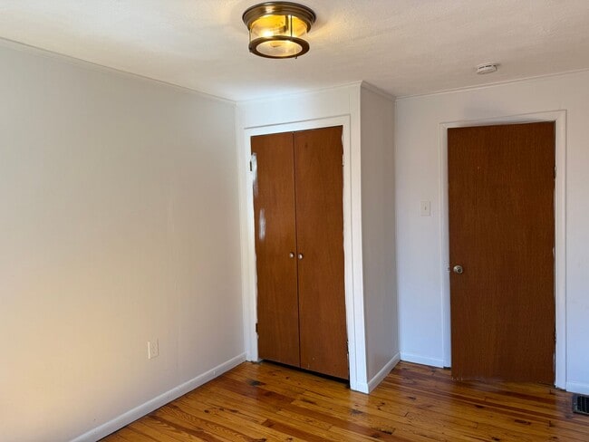 Building Photo - Newly Renovated 3-Bedroom, 1-Bathroom End-Row Townhome with Bonus Room & Backyard!