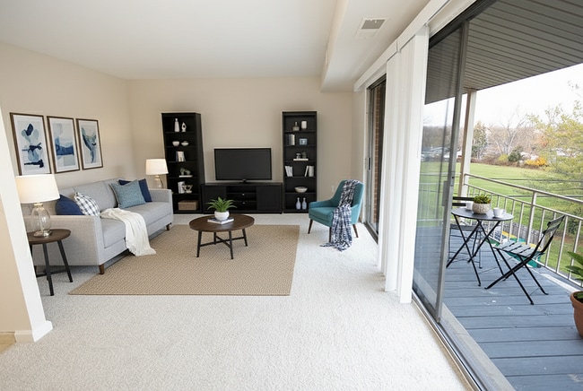 Living/Balcony Staged - Carriage Hill