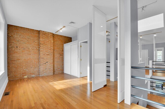 Building Photo - Architecturally Stunning Curtis Park Townhome With Historic Charm