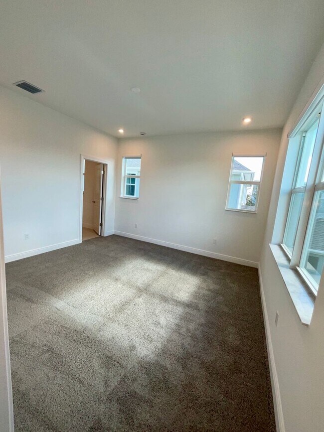 Building Photo - 3/2.5/2 Townhome in Rosette Park at Newfield