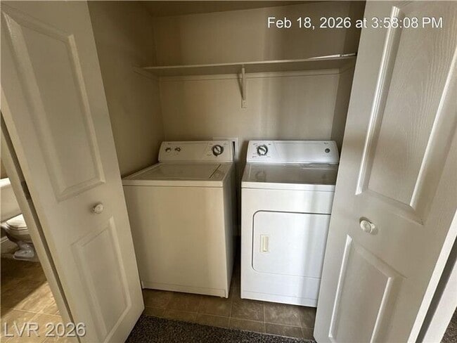 Building Photo - Bright Northwest Second-Floor Condo with Oversized Balcony & Community Pool!