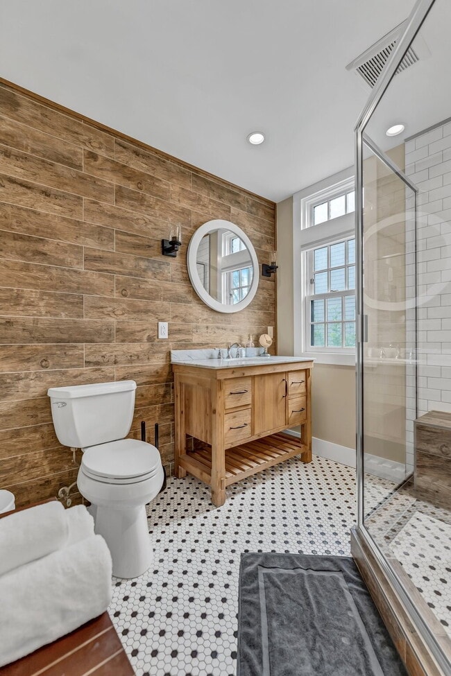Building Photo - Furnished 1-Bedroom Lower Apartment on Main St