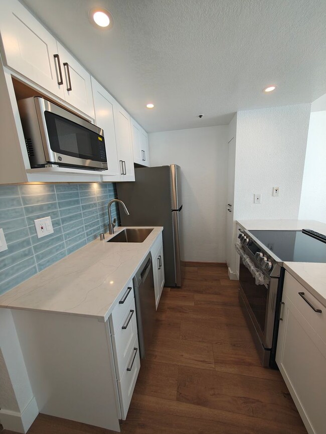 Building Photo - Downtown Parking Included in rent! Spacious 8th Floor Studio at the Baycrest Towers with a great ...