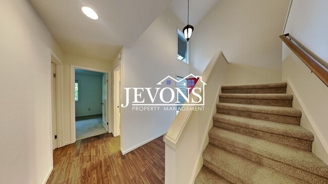 Building Photo - Top-floor 2-level condo with brand-new kitchen and ensuite bath – Utilities and internet included...