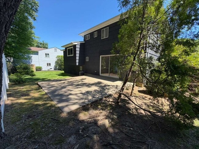 Building Photo - Spacious 4-Bedroom Home with Functional Layout, Backyard Access & Attached Garage