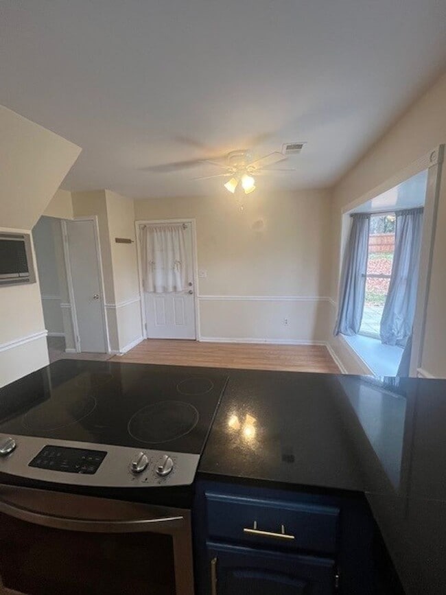 Building Photo - LOVELY CAPE COD WITH 4 BEDS, 2 BATHS AND GARAGE