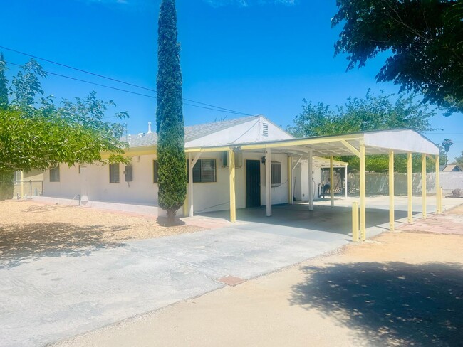 Building Photo - Charming 3-Bedroom Home with Wood Ceilings...