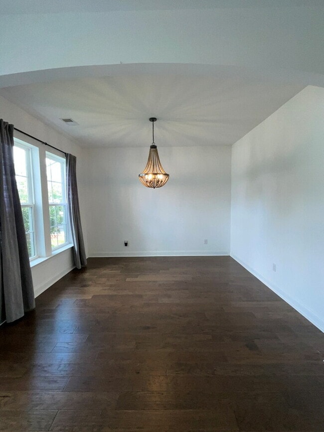 Building Photo - "Spacious 4-Bed Oasis with Stunning Lake V...